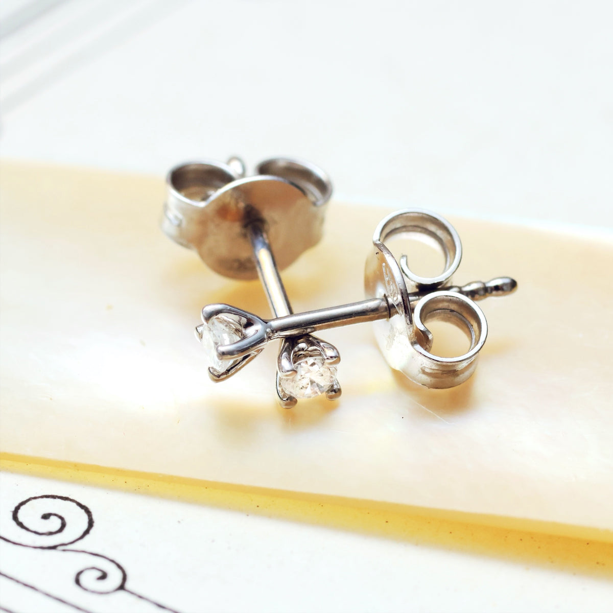 Tiny White Gold Diamond Stud Earrings