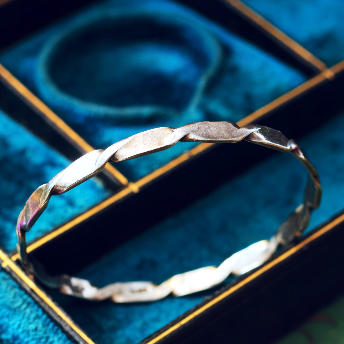 Hand Forged Modernist Silver Twist Bangle