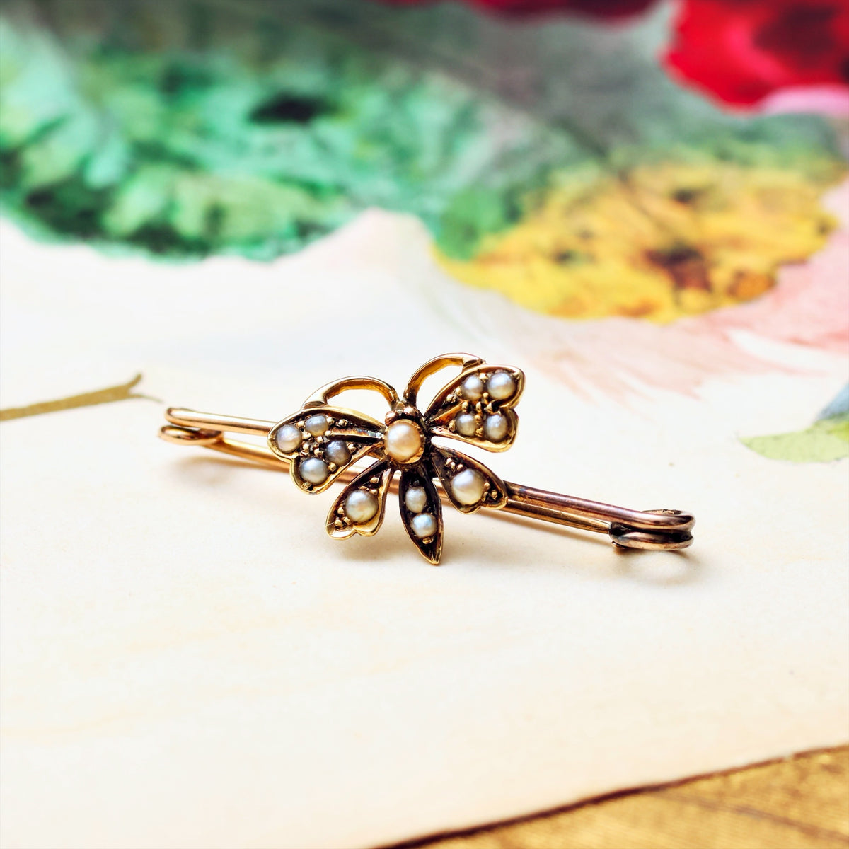 A Late Victorian Seed Pearl Butterfly Brooch