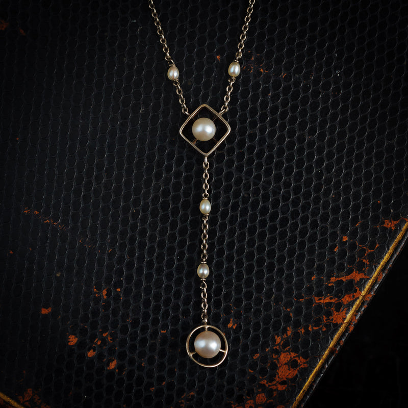 An Antique Platinum and Natural Pearl Lavaliere Pendant