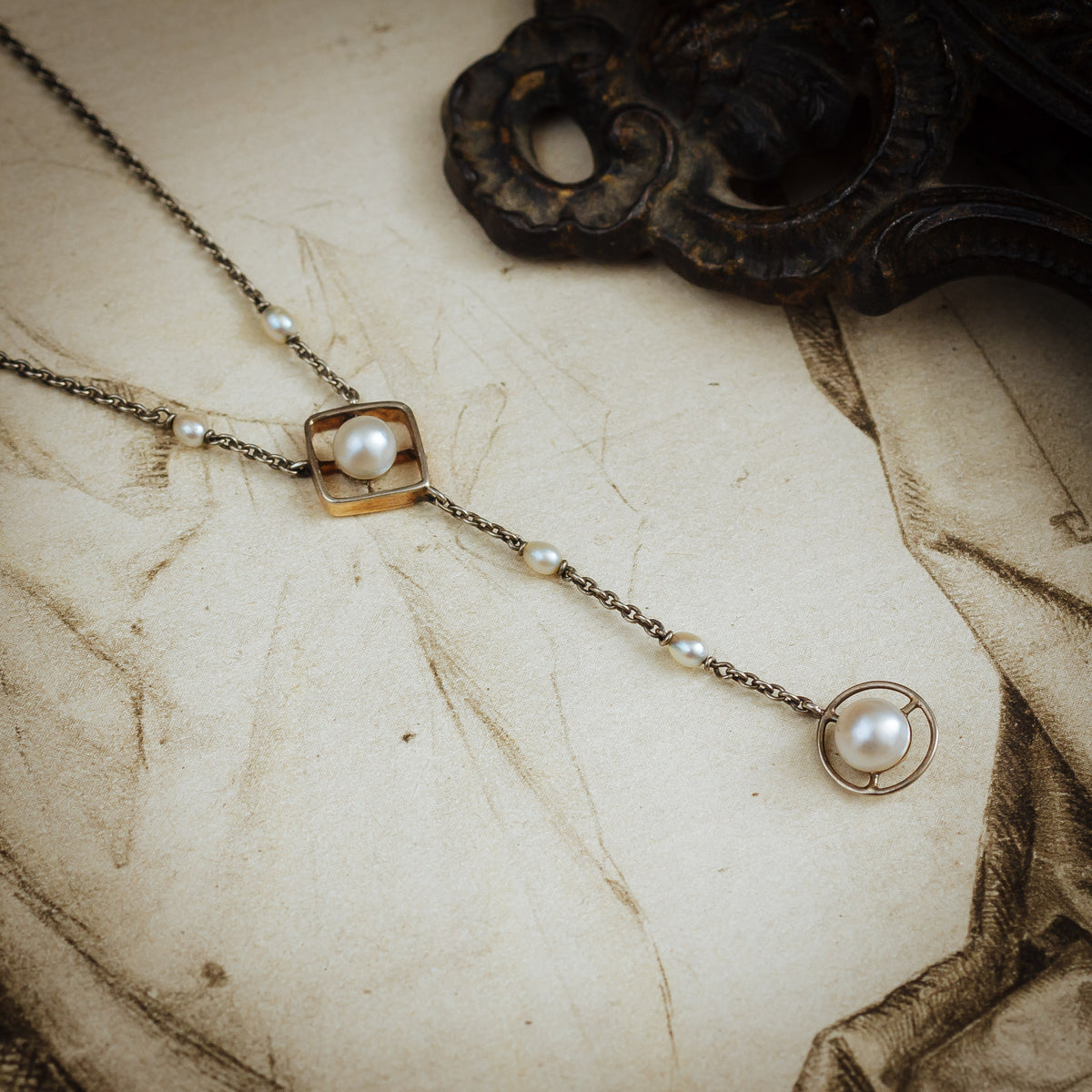 An Antique Platinum and Natural Pearl Lavaliere Pendant