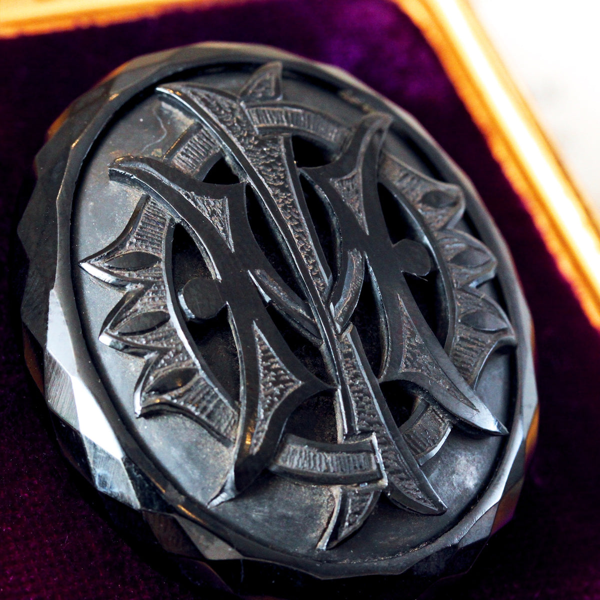 Victorian Whitby Jet 'IMO' Brooch