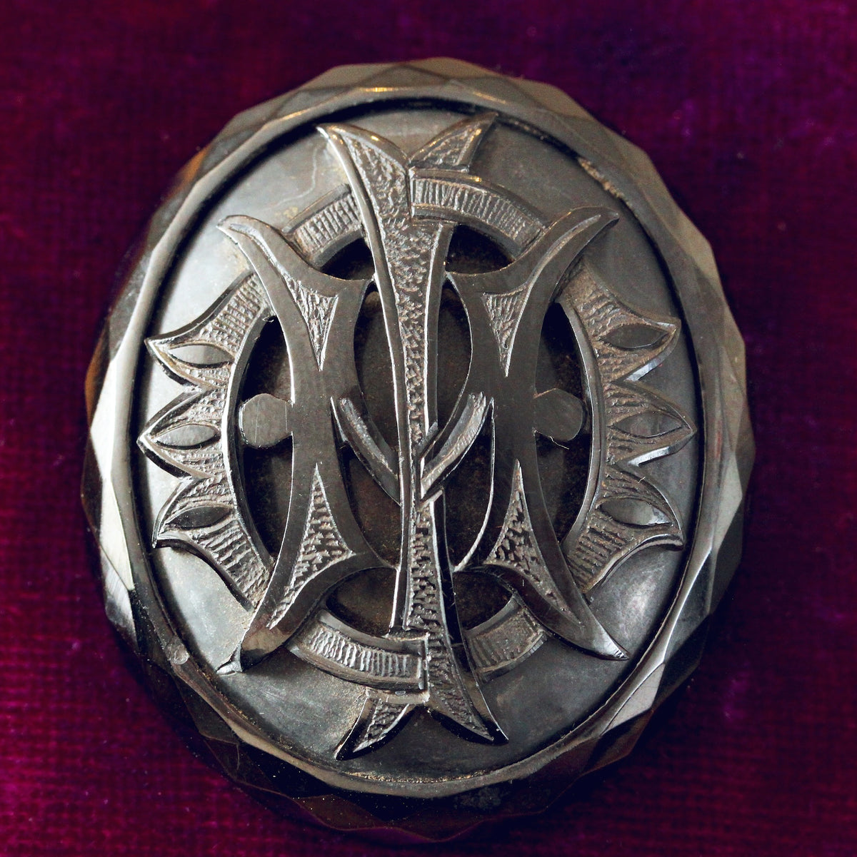 Victorian Whitby Jet 'IMO' Brooch