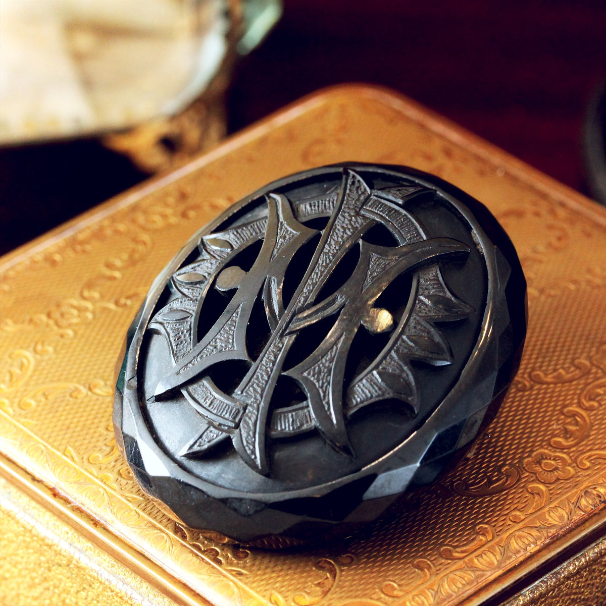 Victorian Whitby Jet 'IMO' Brooch