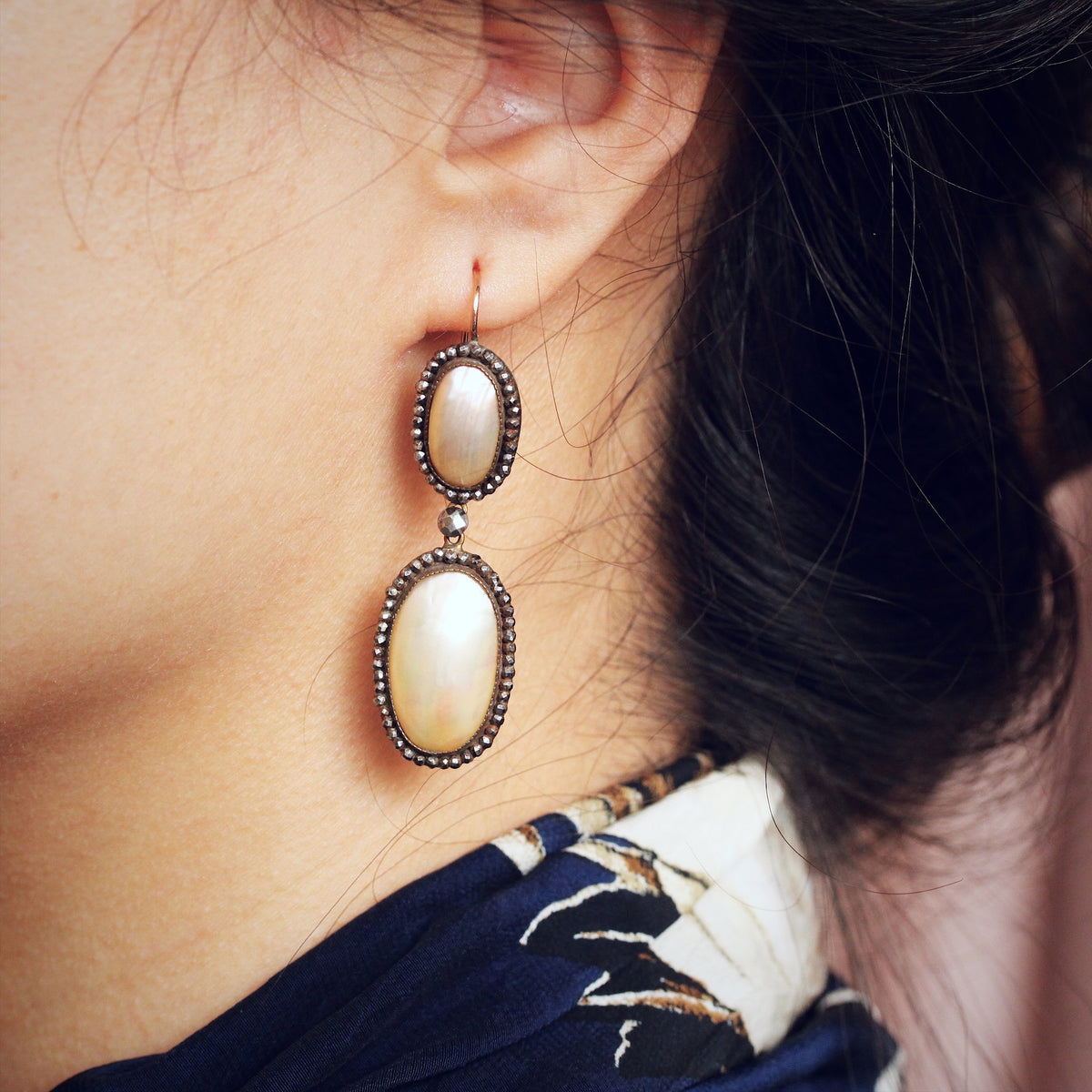 Coque de Perle and cut steel earrings